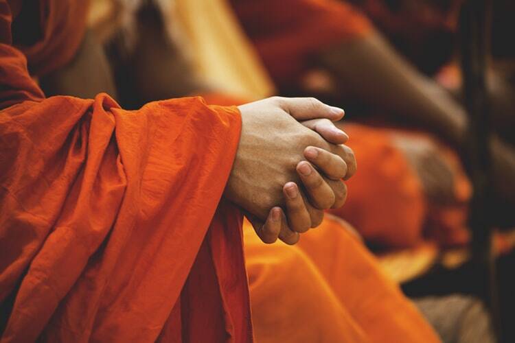 A man fasting for healing with his arms folded