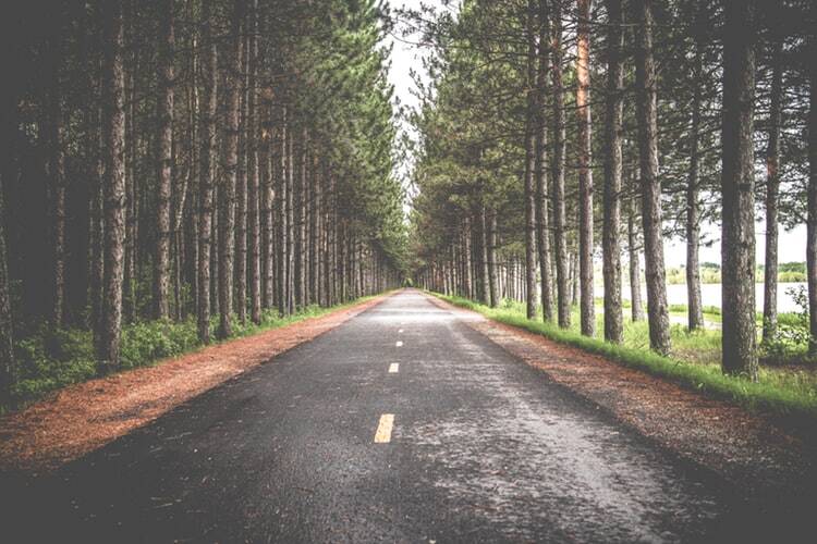 An open road representing the power of belief
