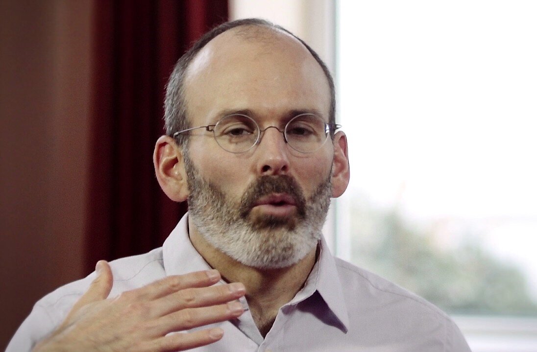 Judson Brewer pictured here giving a Ted Talk on how to break a bad habit using the power of mindfulness meditation.