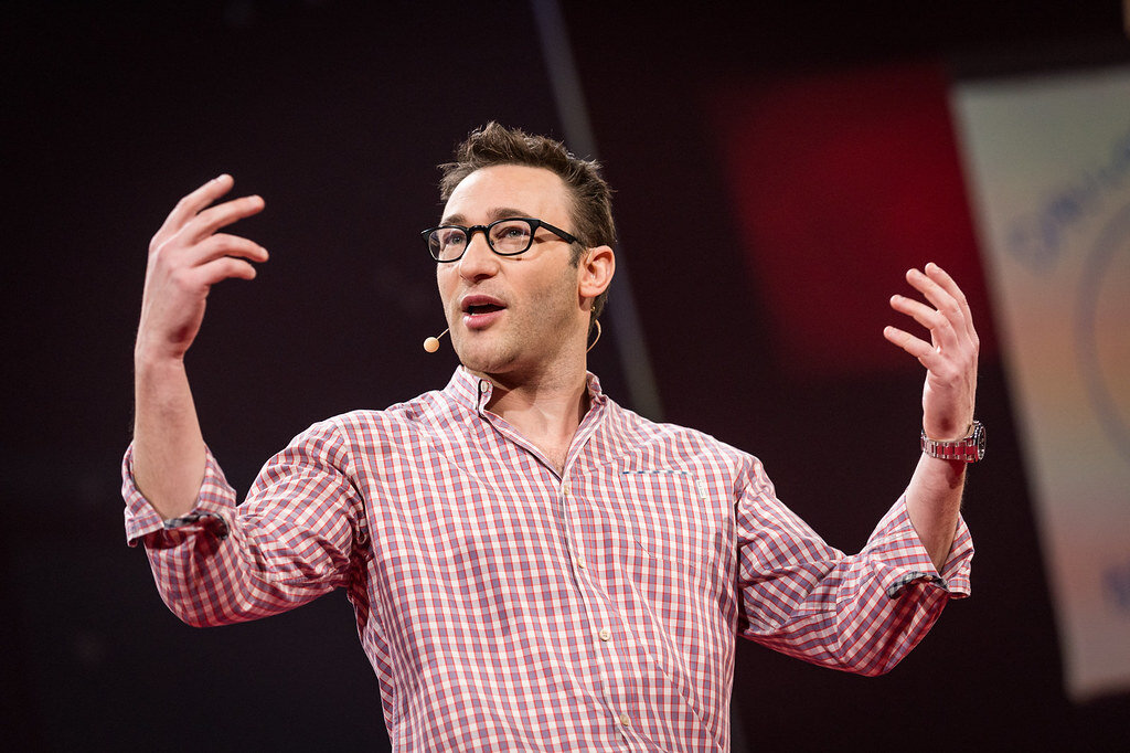 Simon Sinek giving a Ted Talk on the power of love in leadership 