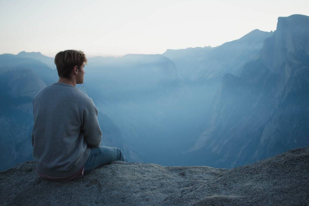 A man doing the meditation challenge for one hour