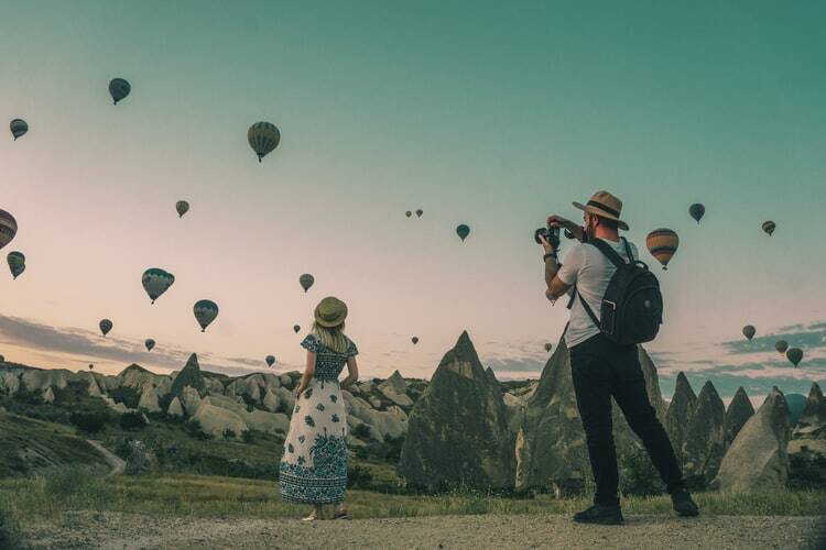 a family traveling and taking pictures in a country where a foreign language is spoken..