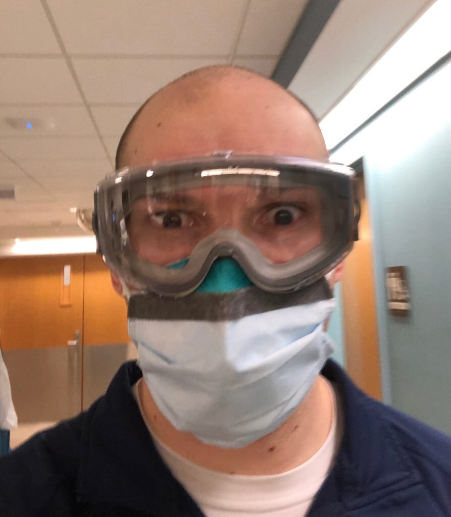 A nurse wearing an N-95 mask 