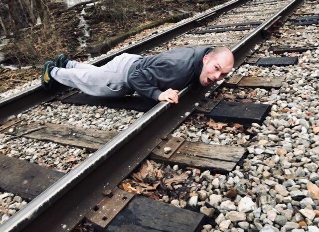 Chase lying on train tracks in a testament to his good judgment