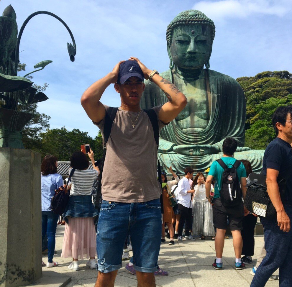 A man at Kotoku temple in Japan 